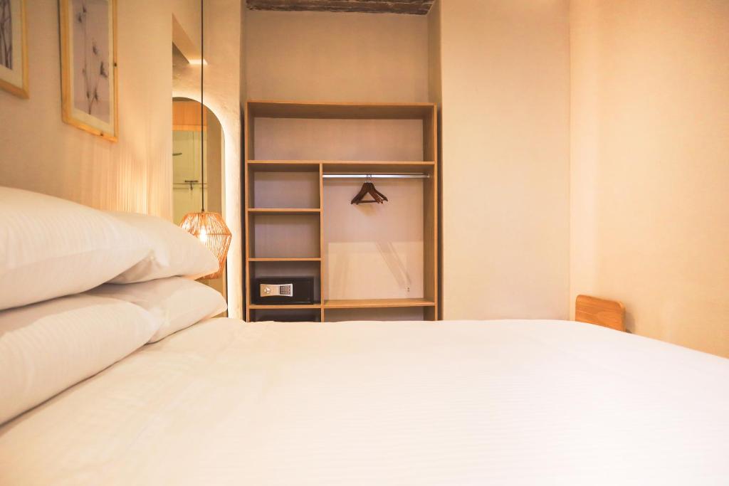 Postel nebo postele na pokoji v ubytování Hotel Casa La Mantilla by Faranda Boutique