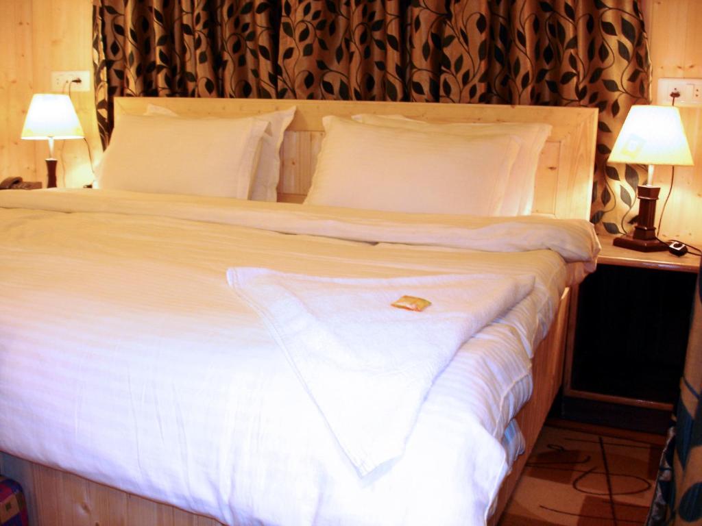 Postel nebo postele na pokoji v ubytování Ikraam Inn Bed & Breakfast