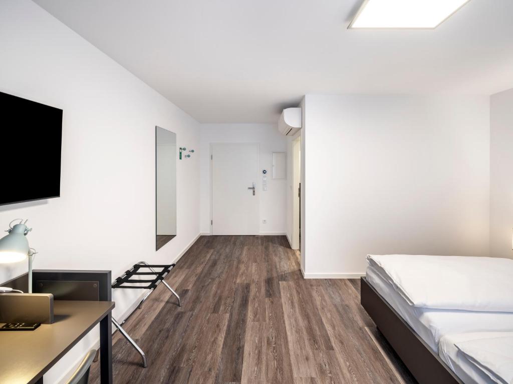 Postel nebo postele na pokoji v ubytování Mood contemporary living