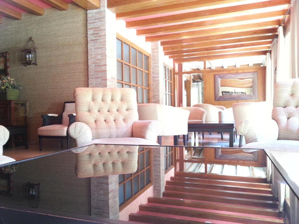 Posezení v ubytování Hotel Villa de Canfranc