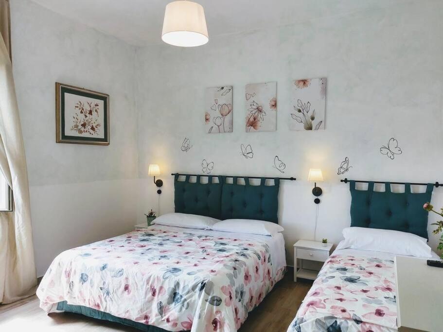 Giường trong phòng chung tại Casa di Campagna