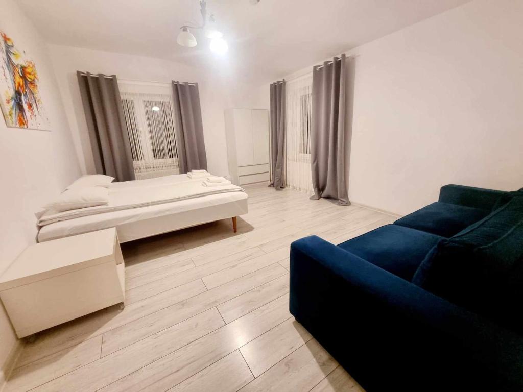 Wileńska Pokoje - Quadruple Room With Shared Bathroom
