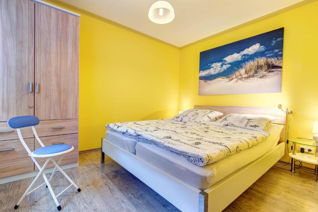 Postel nebo postele na pokoji v ubytování Koserow, Koserower Strand - App