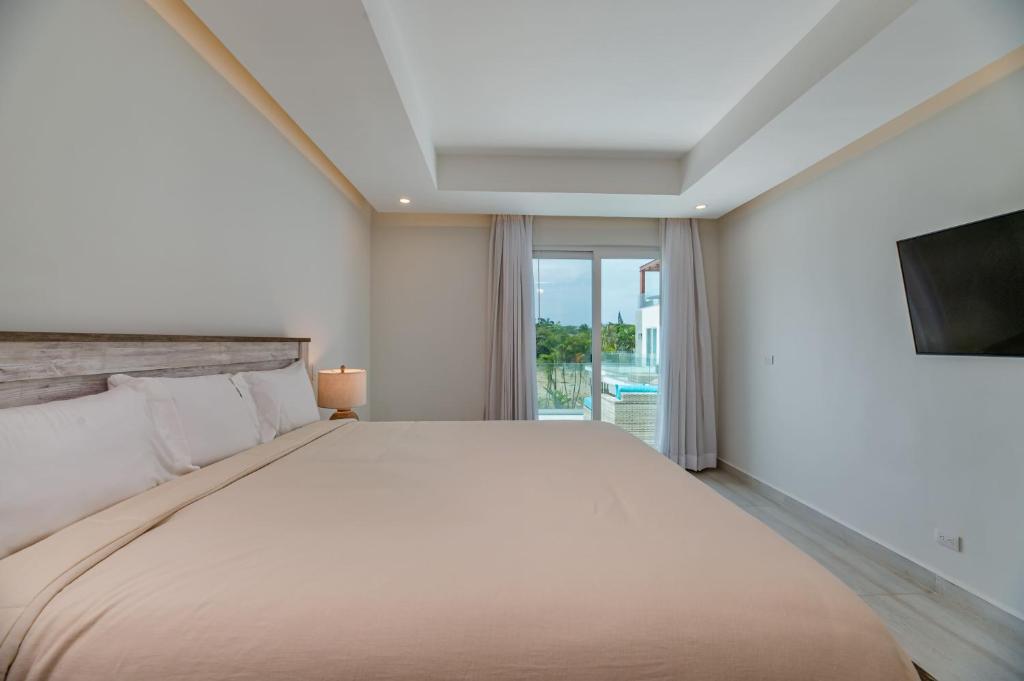 Postel nebo postele na pokoji v ubytování Ocean One Roatan