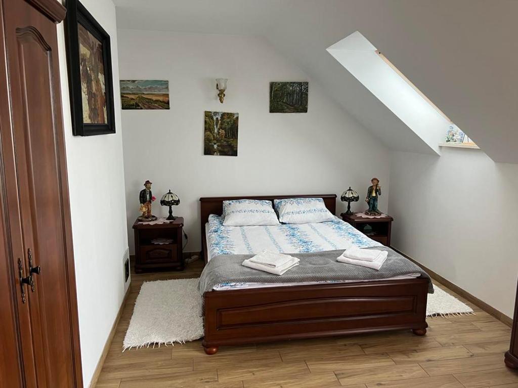 Postel nebo postele na pokoji v ubytování Jaworzynka Nad Jeziorem