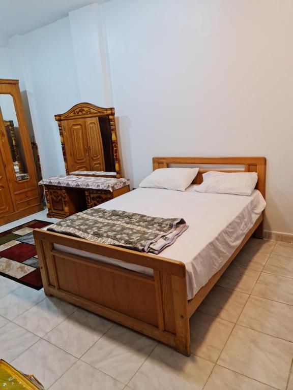 Postel nebo postele na pokoji v ubytování Happy pyramids inn Hotel