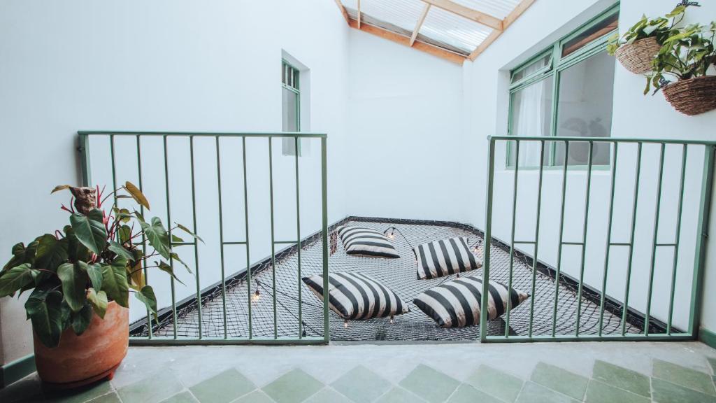 Postel nebo postele na pokoji v ubytování Centro Hostel Medellin