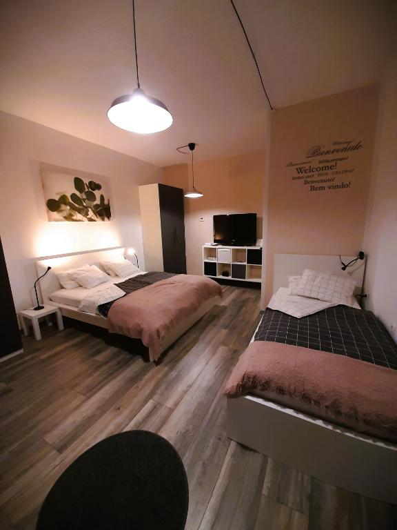 Postel nebo postele na pokoji v ubytování apartma Vila TARA