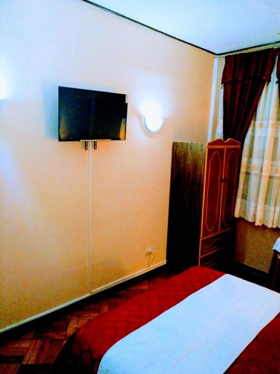 TV a/nebo společenská místnost v ubytování the scandinavian