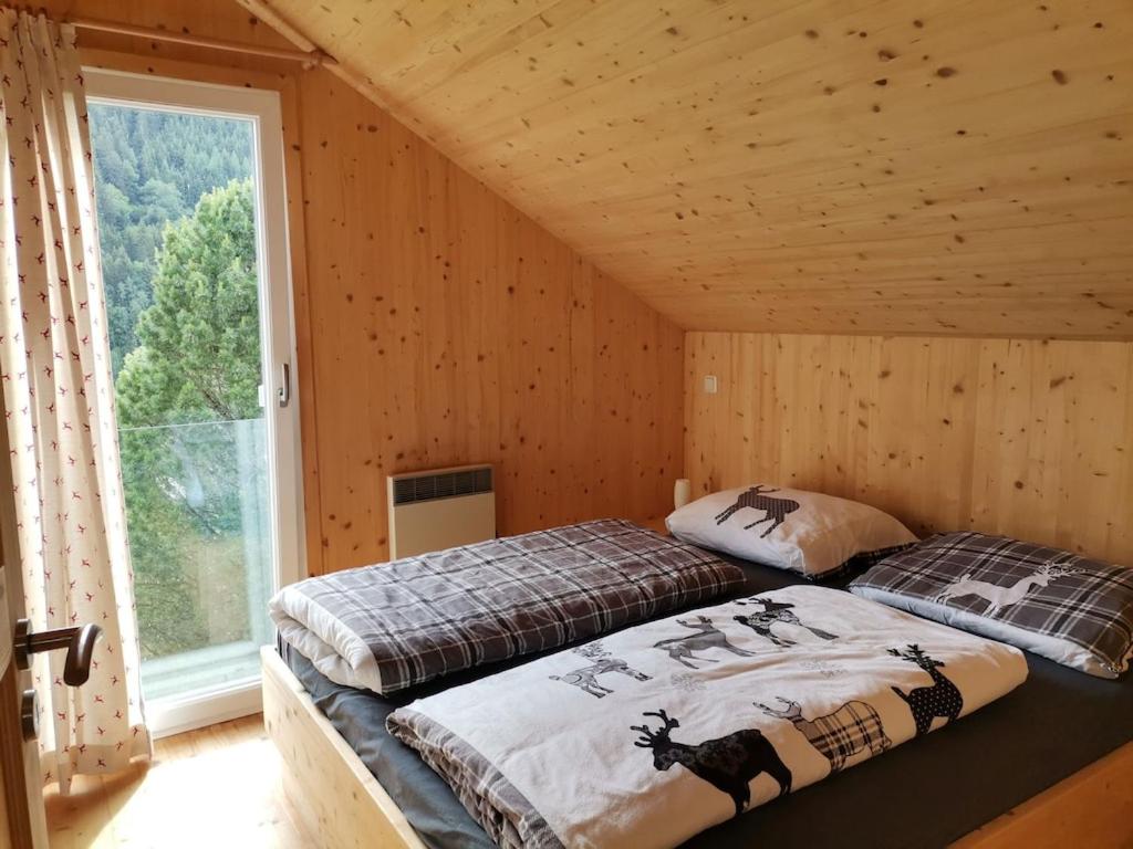 Postel nebo postele na pokoji v ubytování PAAL 162 - Tolle Aussicht, 2 Terasssen, Großes Grundstück