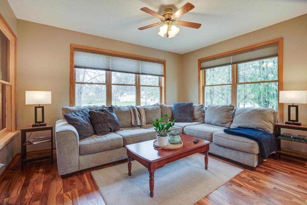 a living room with a couch and a table at Family-Friendly Home in Pepin Walk to Main St! in Pepin