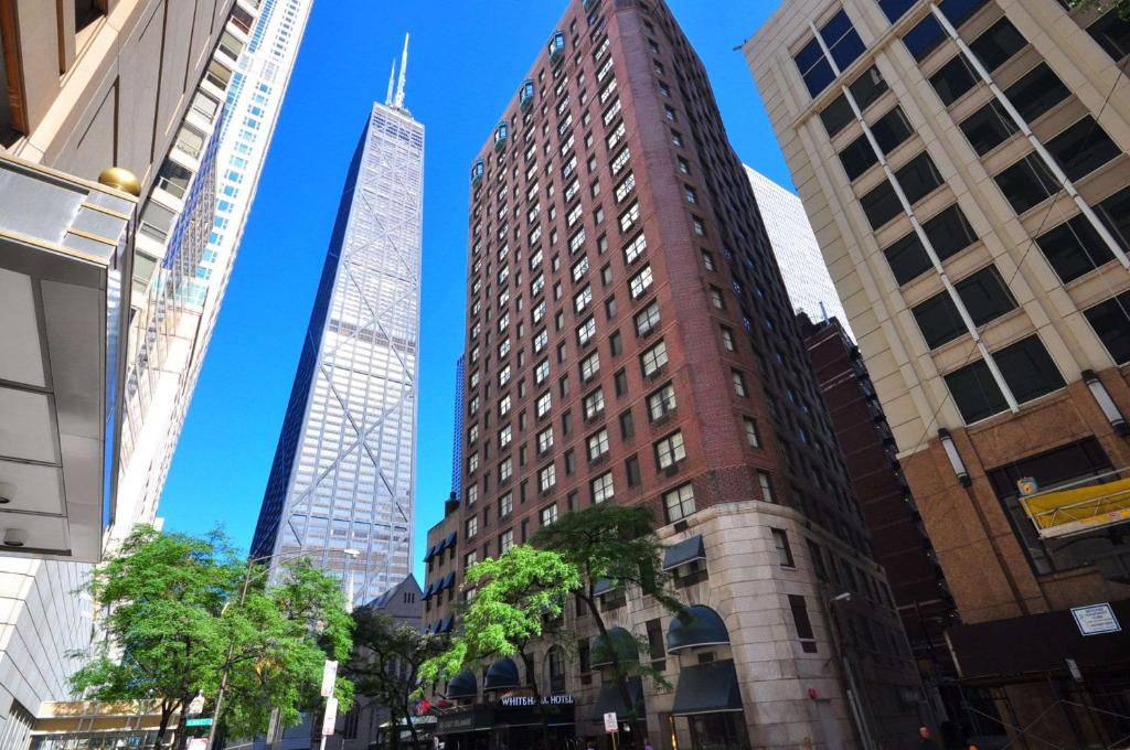 a group of tall buildings in a city at The Whitehall Hotel - BW Premier Collection in Chicago