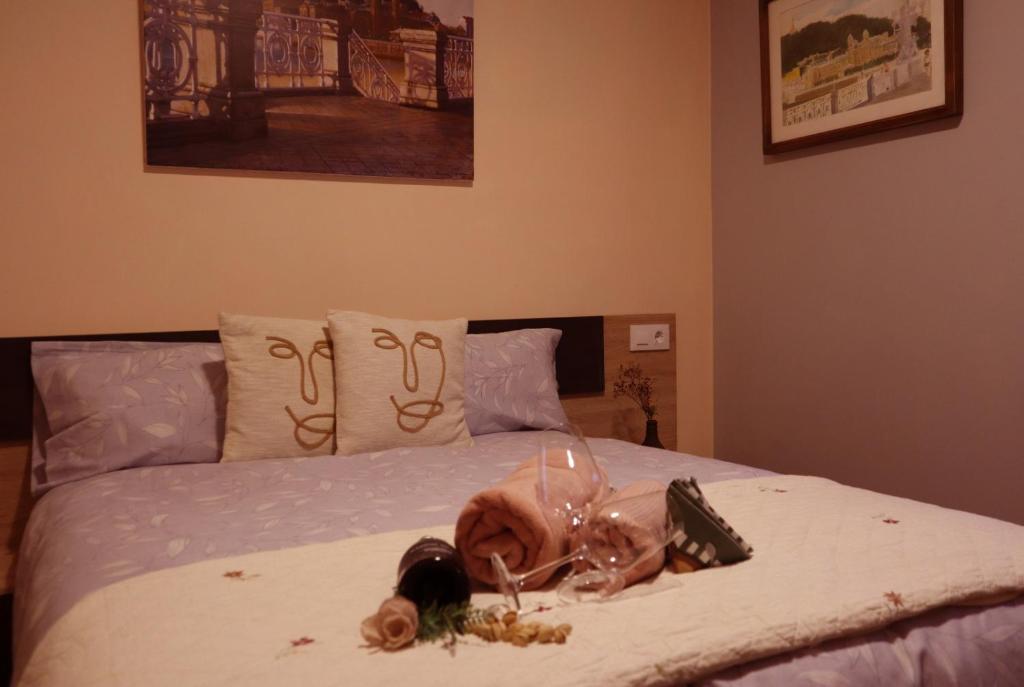 Säng eller sängar i ett rum på Casa-museo Genia Trigo