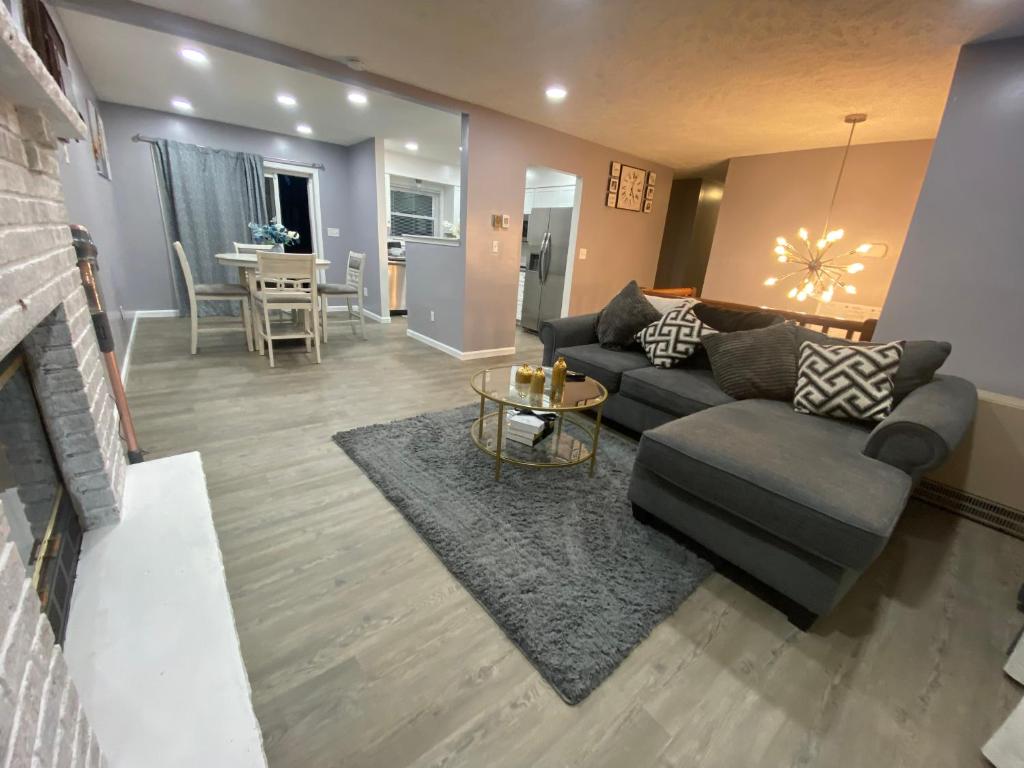 a living room with a couch and a table at Home in Tobyhanna, Poconos Mountain, Pennsylvania in Tobyhanna