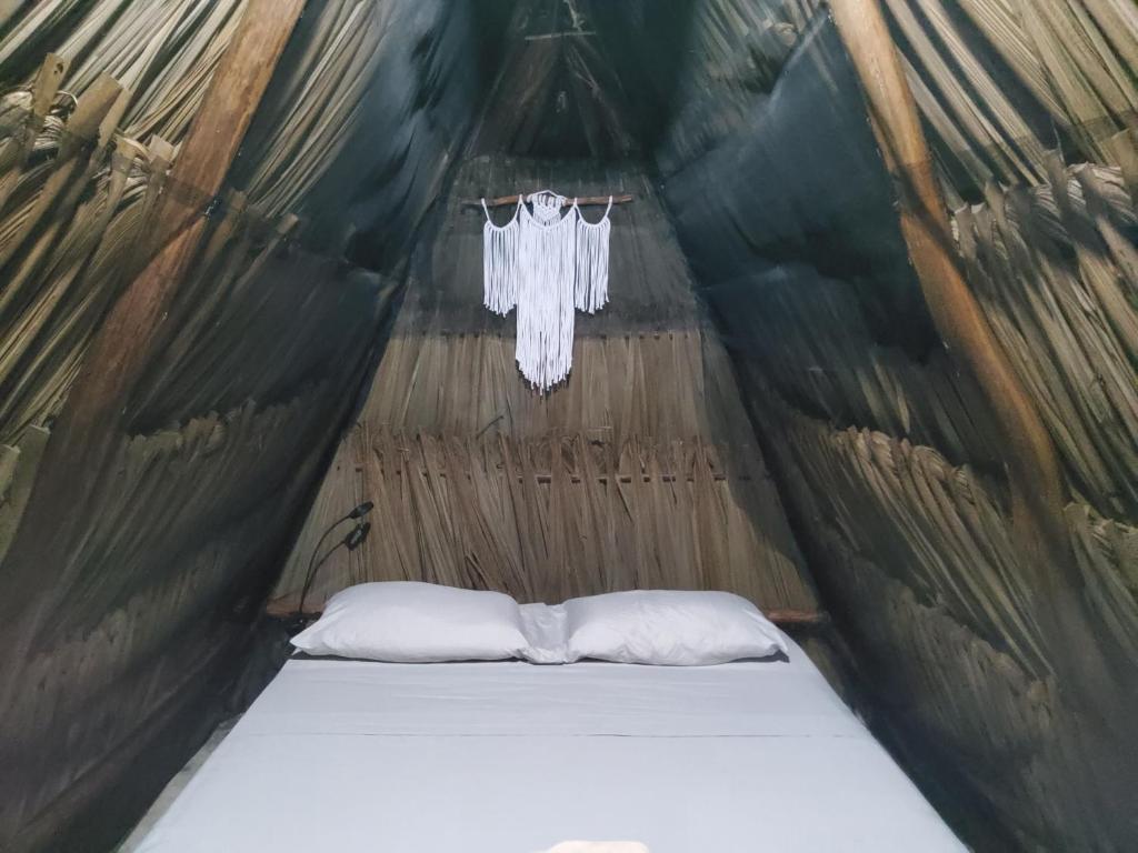 Postel nebo postele na pokoji v ubytování Hakuna Matata Glamping