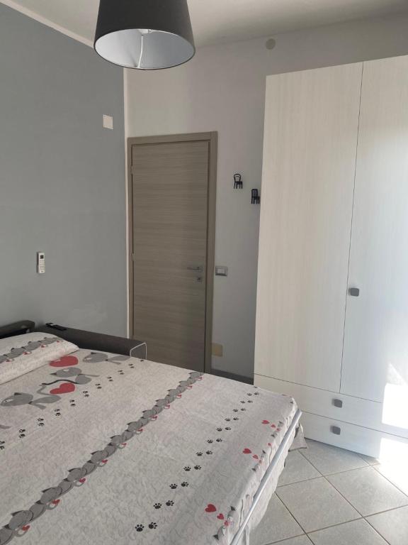 Postel nebo postele na pokoji v ubytování Lo scrigno dei nonni