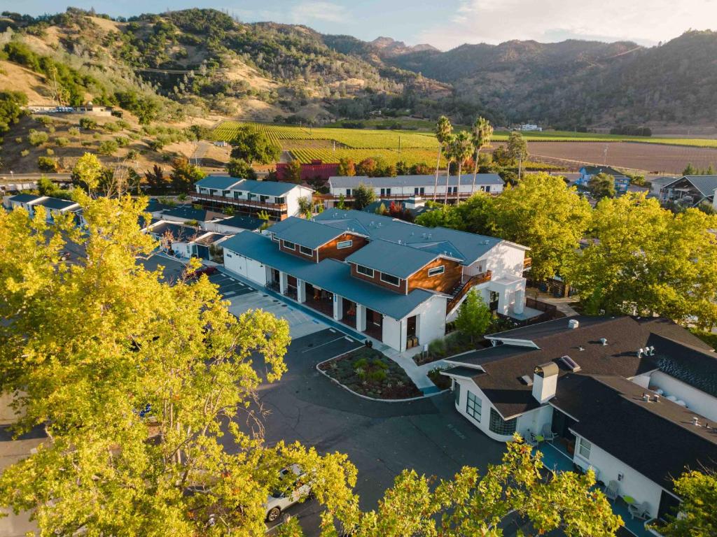 an aerial view of a house with a parking lot at Calistoga Motor Lodge and Spa, a JdV by Hyatt Hotel in Calistoga