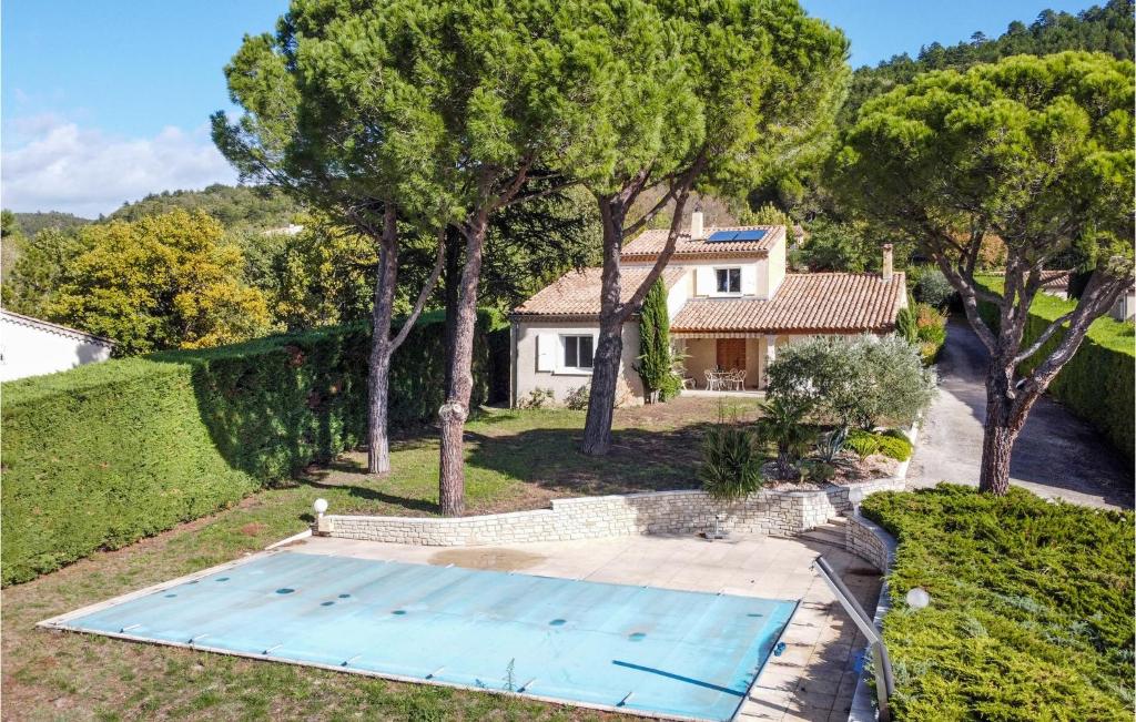 an aerial view of a house with a swimming pool at 3 Bedroom Awesome Home In Puy-saint-martin in Puy-Saint-Martin