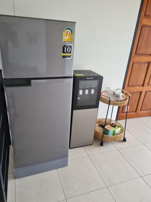 Kuchyň nebo kuchyňský kout v ubytování BaanBaan Homestay