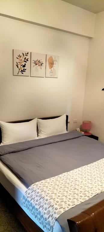 Postel nebo postele na pokoji v ubytování Redbean Guesthouse