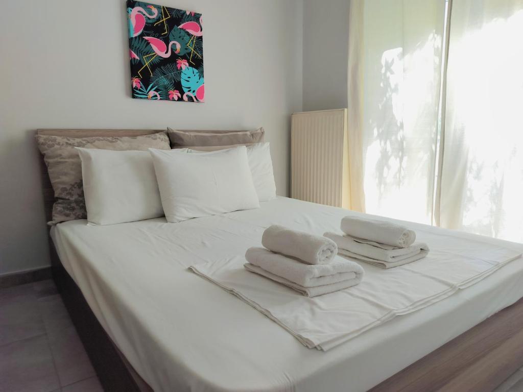 Posteľ alebo postele v izbe v ubytovaní Maiandros Downtown - 1 BR Apartment- Explore Center by foot - Close to Aristotelous square