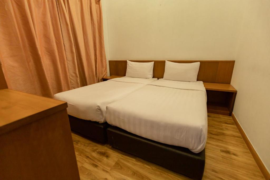 Postel nebo postele na pokoji v ubytování Hills Aranda Nova Hotel