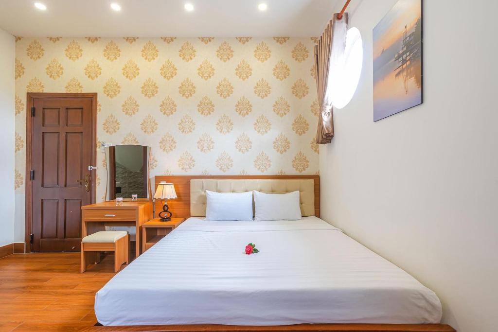 Giường trong phòng chung tại Villa Hoa Ly Đà Lạt