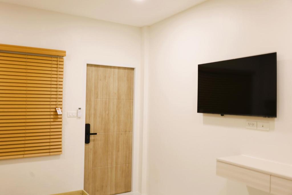 TV a/nebo společenská místnost v ubytování S.P.C Apartment by Brodderud