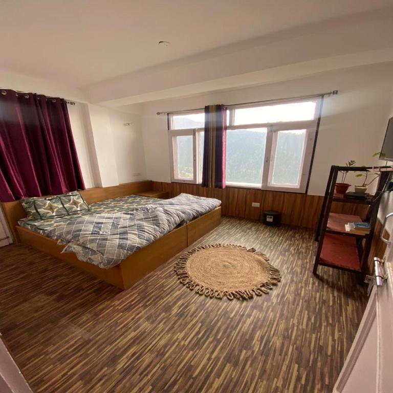 The Royal Orchard Homestay by StayApart - Deluxe Room