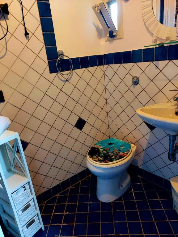 Koupelna v ubytování B&B Mannalà