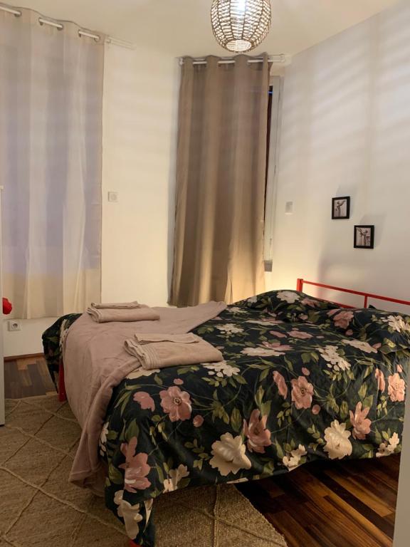 Posteľ alebo postele v izbe v ubytovaní Maison Jeanne d’Arc
