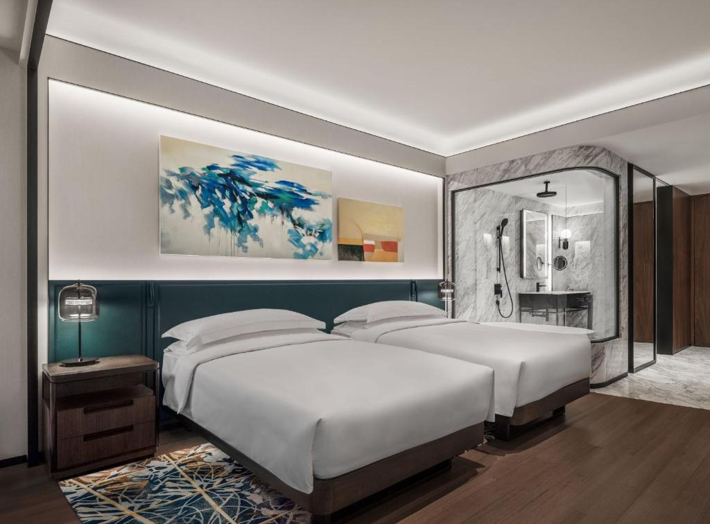 Postel nebo postele na pokoji v ubytování Andaz Macau, By Hyatt