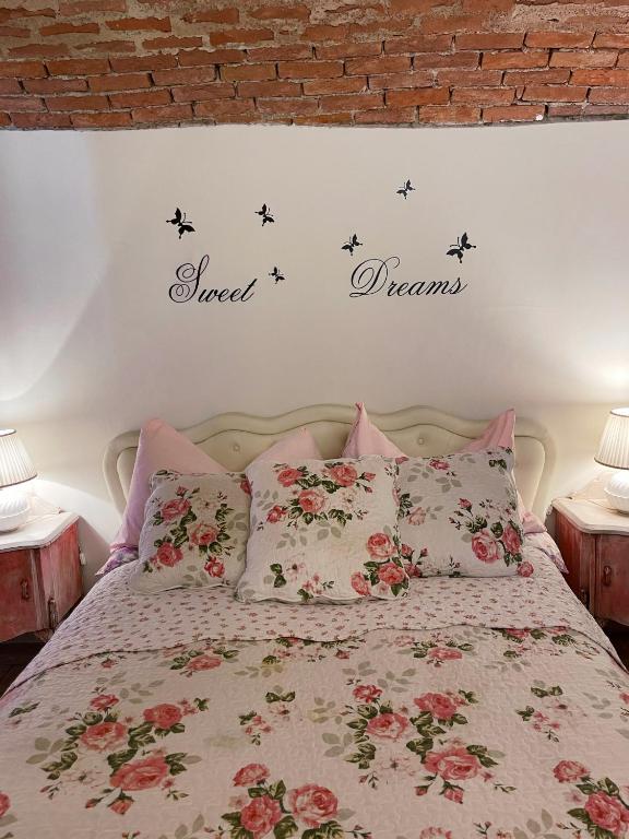 Postel nebo postele na pokoji v ubytování Grotto Flora B&B Chambres de charme
