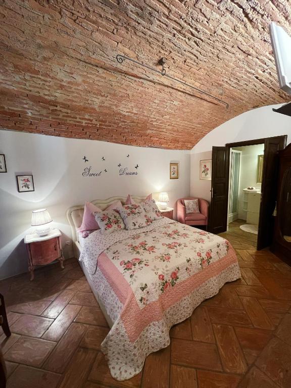 Postel nebo postele na pokoji v ubytování Grotto Flora B&B Chambres de charme