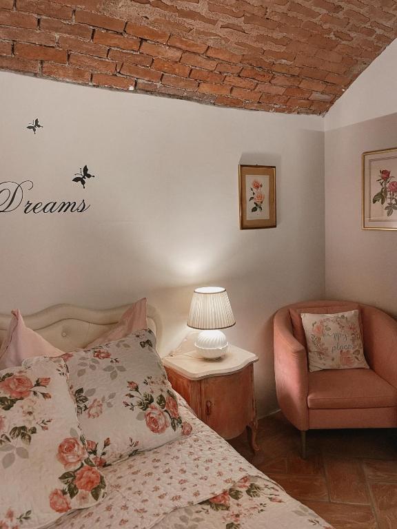 Postel nebo postele na pokoji v ubytování Grotto Flora B&B Chambres de charme