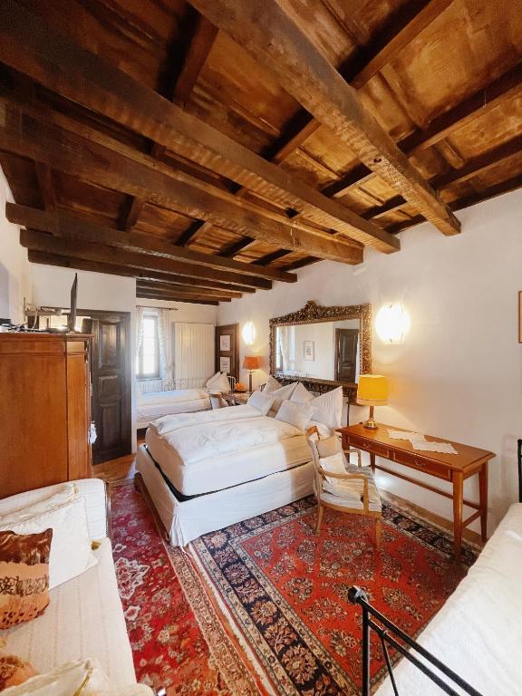 Postel nebo postele na pokoji v ubytování Grotto Flora B&B Chambres de charme