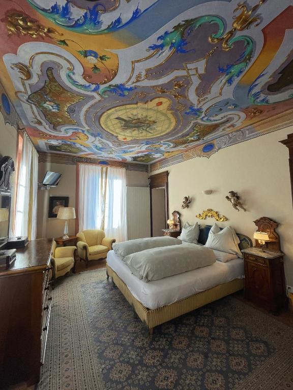 Postel nebo postele na pokoji v ubytování Grotto Flora B&B Chambres de charme