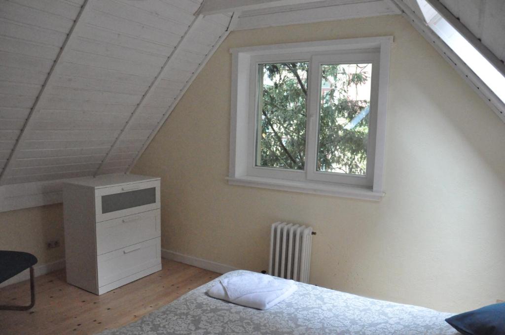 Llit o llits en una habitació de House near to Schönbrunn - Free Parking - 24-7 Check in - 8 Person