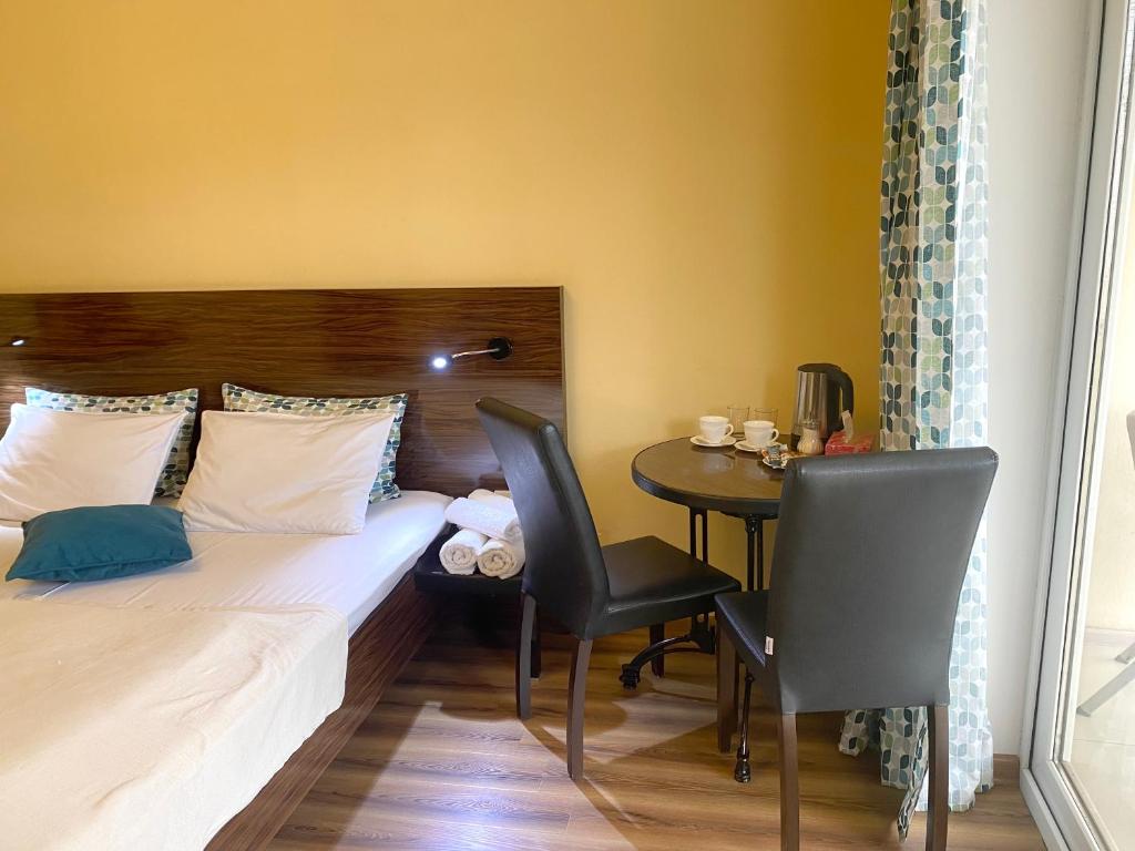 Postel nebo postele na pokoji v ubytování Guesthouse Aygestan