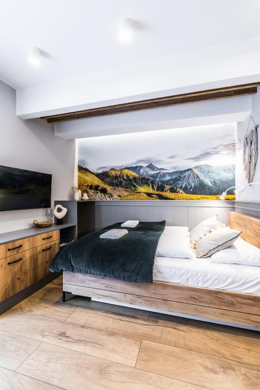 Posteľ alebo postele v izbe v ubytovaní Aparthotel Lucylla