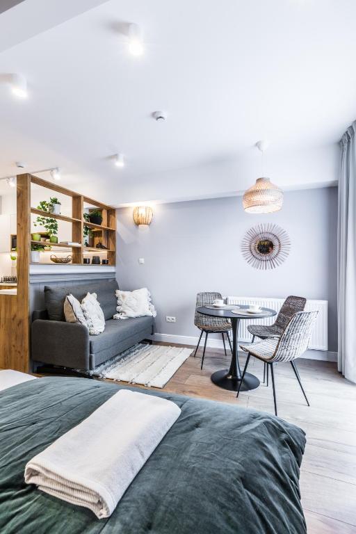 Posteľ alebo postele v izbe v ubytovaní Aparthotel Lucylla