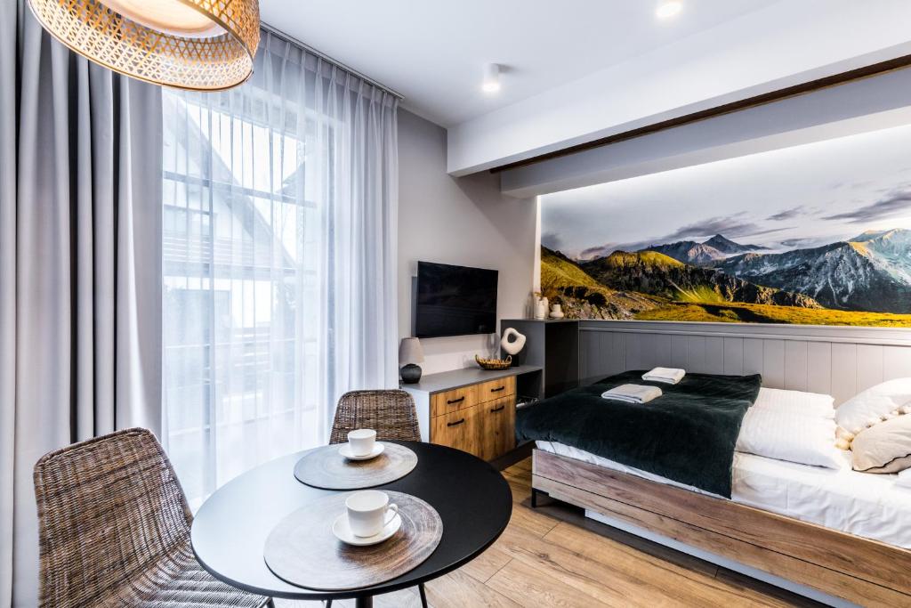 Posteľ alebo postele v izbe v ubytovaní Aparthotel Lucylla