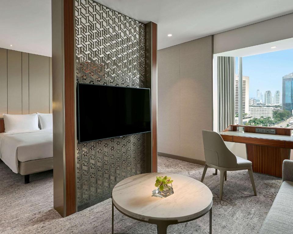 TV a/nebo společenská místnost v ubytování Grand Hyatt Jakarta