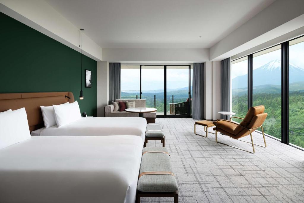 Ένα ή περισσότερα κρεβάτια σε δωμάτιο στο Fuji Speedway Hotel, in The Unbound Collection by Hyatt