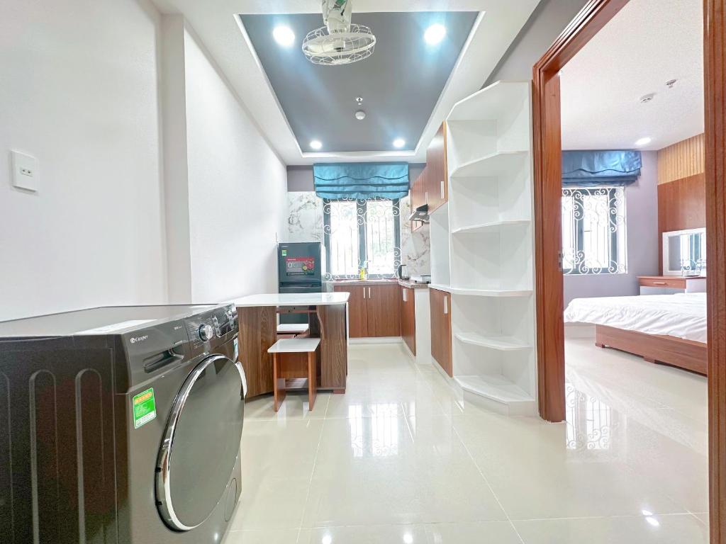 Кухня или мини-кухня в Milanesa Hotel and Apartment

