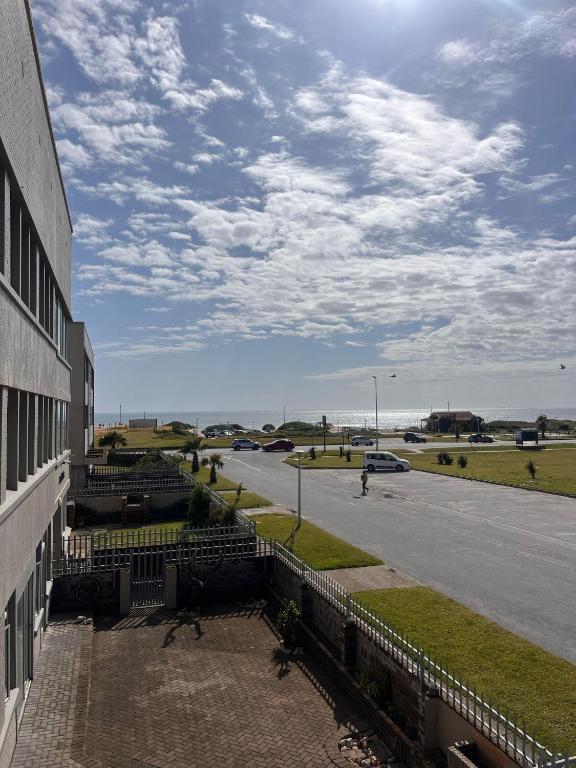 a view of a parking lot from a building at Brightways AirB&B in Summerstrand