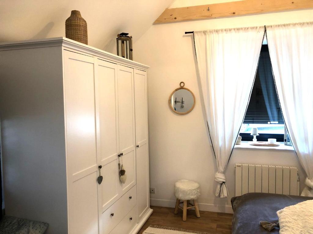 Postel nebo postele na pokoji v ubytování Gîte La Fontaine des Prés