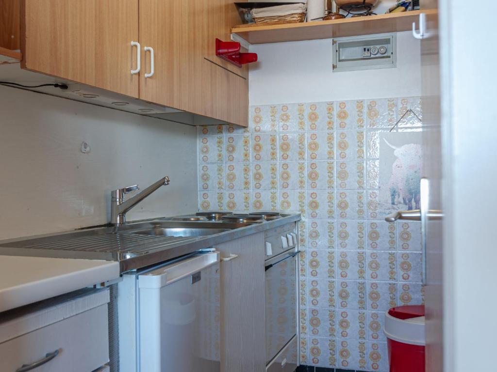 Kuchyň nebo kuchyňský kout v ubytování Apartment Panoramic B1 by Interhome