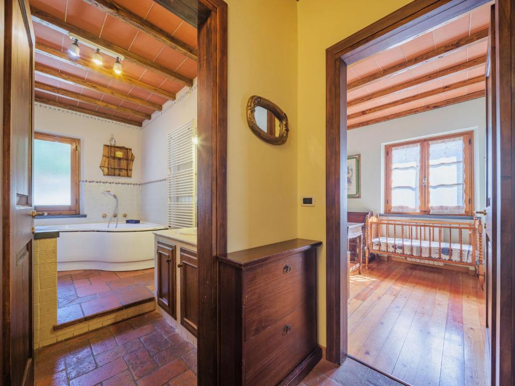 Łóżko lub łóżka w pokoju w obiekcie Holiday Home L'Aia by Interhome