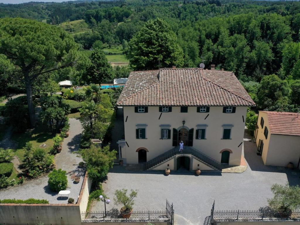 an aerial view of a large white house at Holiday Home Villa La Guardia Vecchia-1 by Interhome in Crespina